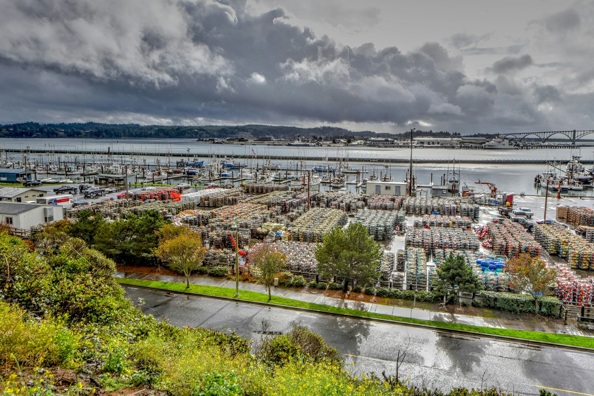 May contain: water, waterfront, architecture, building, cityscape, urban, city, outdoors, port, road, boat, transportation, and vehicle