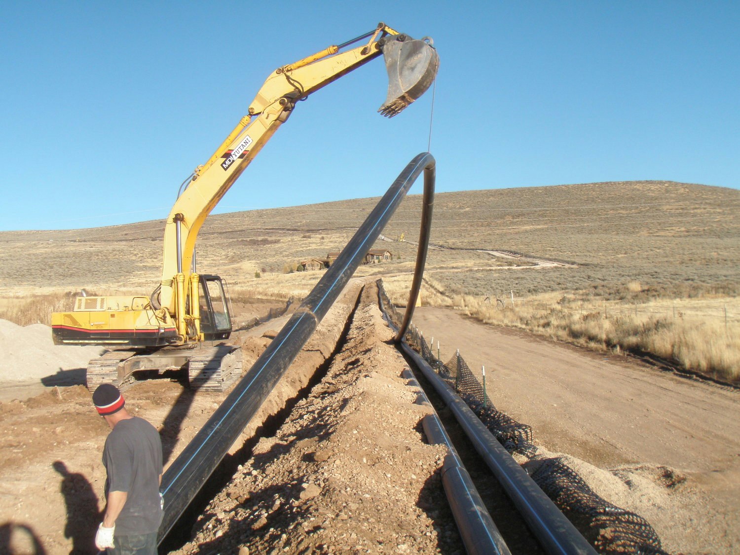 May contain: adult, male, man, person, construction, bulldozer, and machine