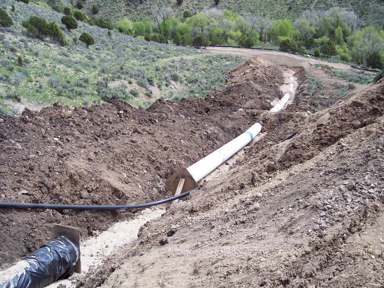 May contain: soil and pipeline