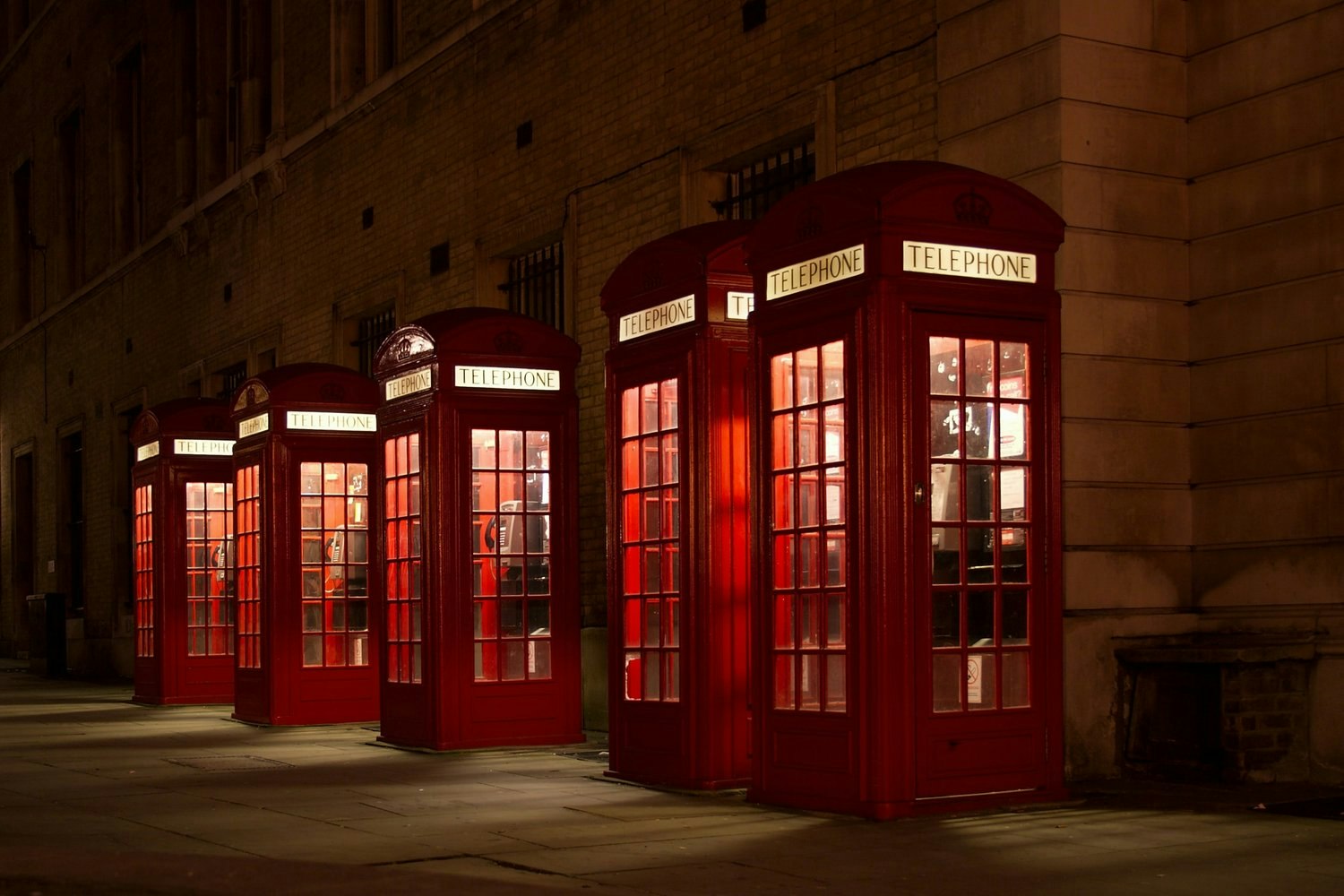 May contain: phone booth, architecture, and building