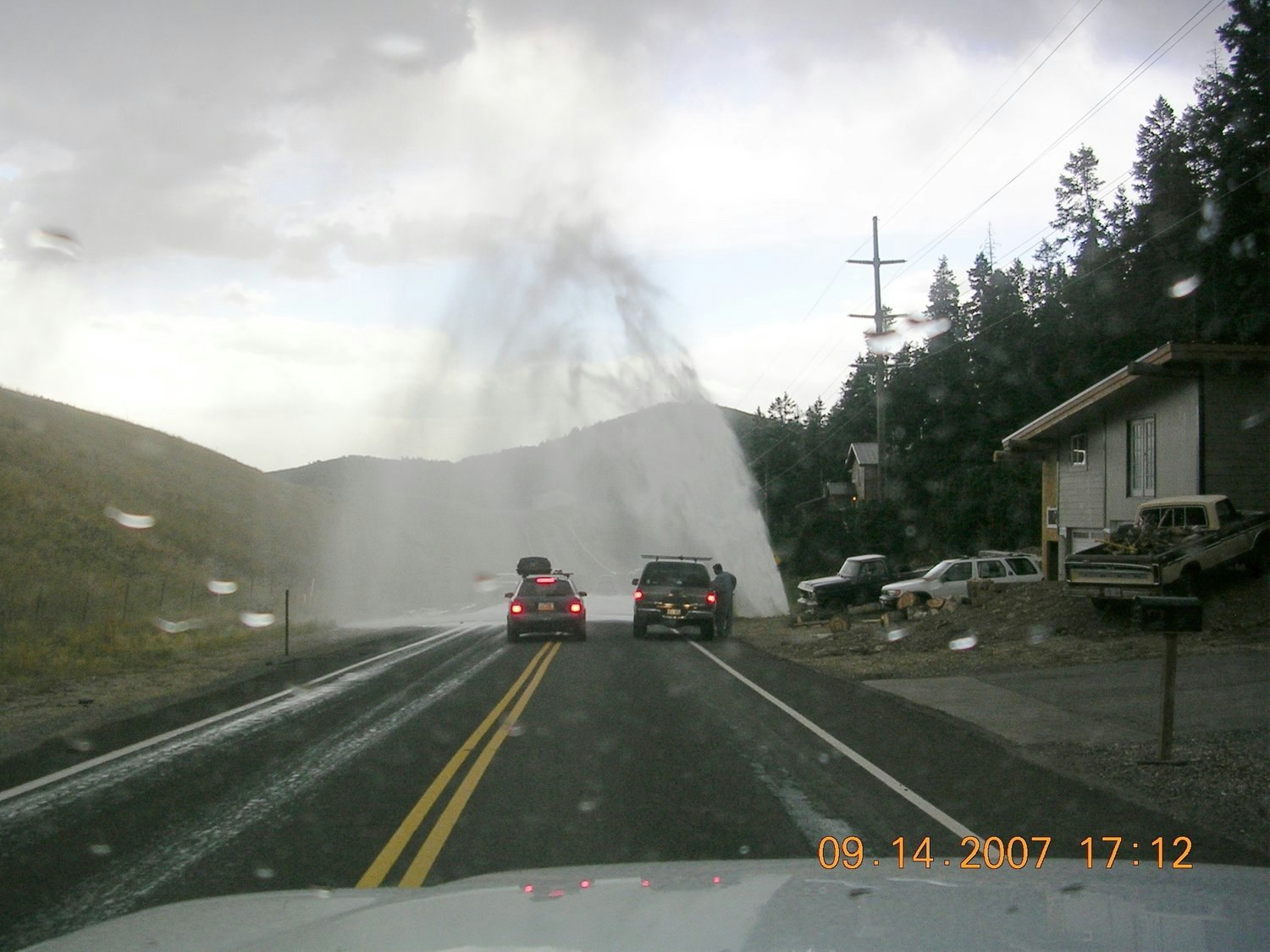 May contain: road, freeway, highway, nature, outdoors, weather, car, transportation, and vehicle