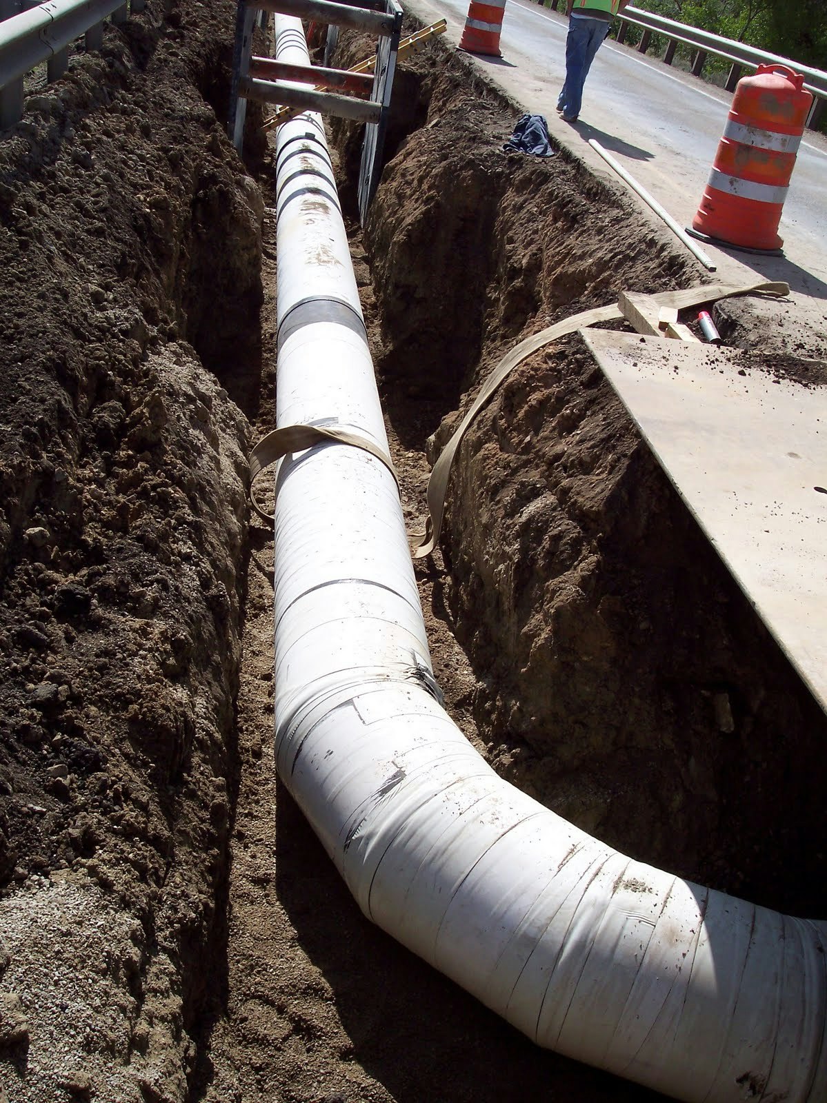 May contain: pipeline and person