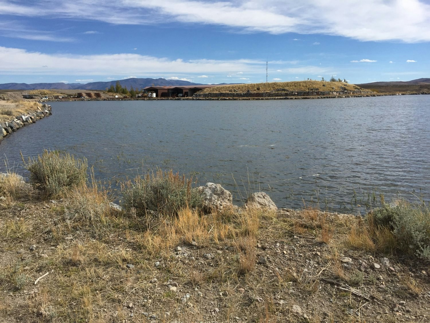 May contain: nature, outdoors, reservoir, water, scenery, wilderness, landscape, lake, land, rock, and pond