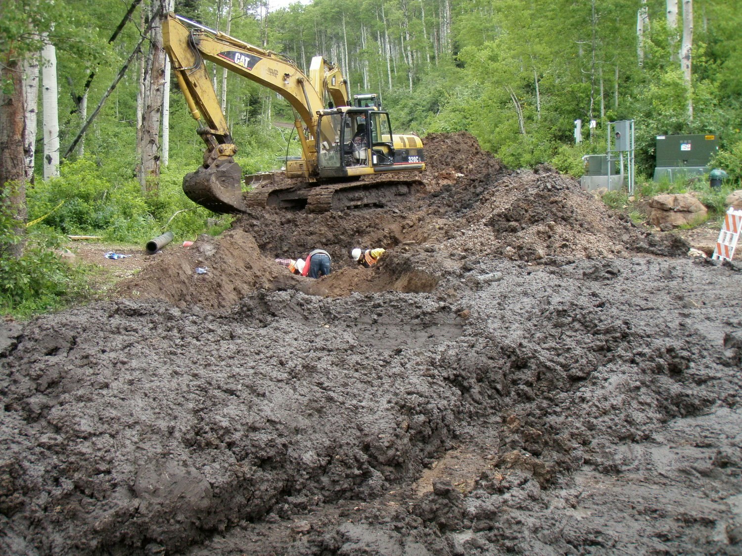 May contain: soil, person, machine, and bulldozer