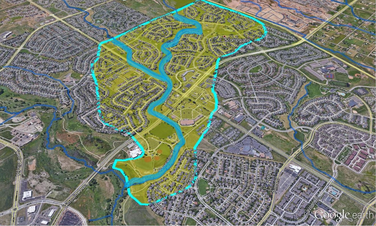 A satellite view of a residential area with marked boundaries, possibly for planning or analysis.