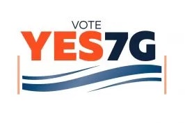 A graphic with the text "VOTE YES 7G" and blue wavy lines below.