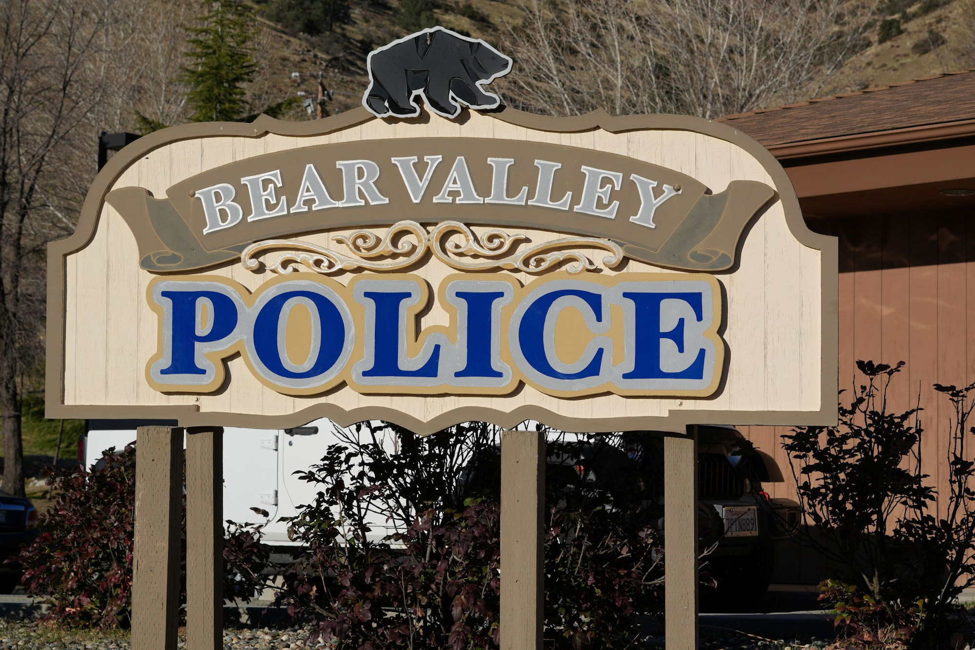 Sign for Bear Valley Police, featuring a bear silhouette on top.