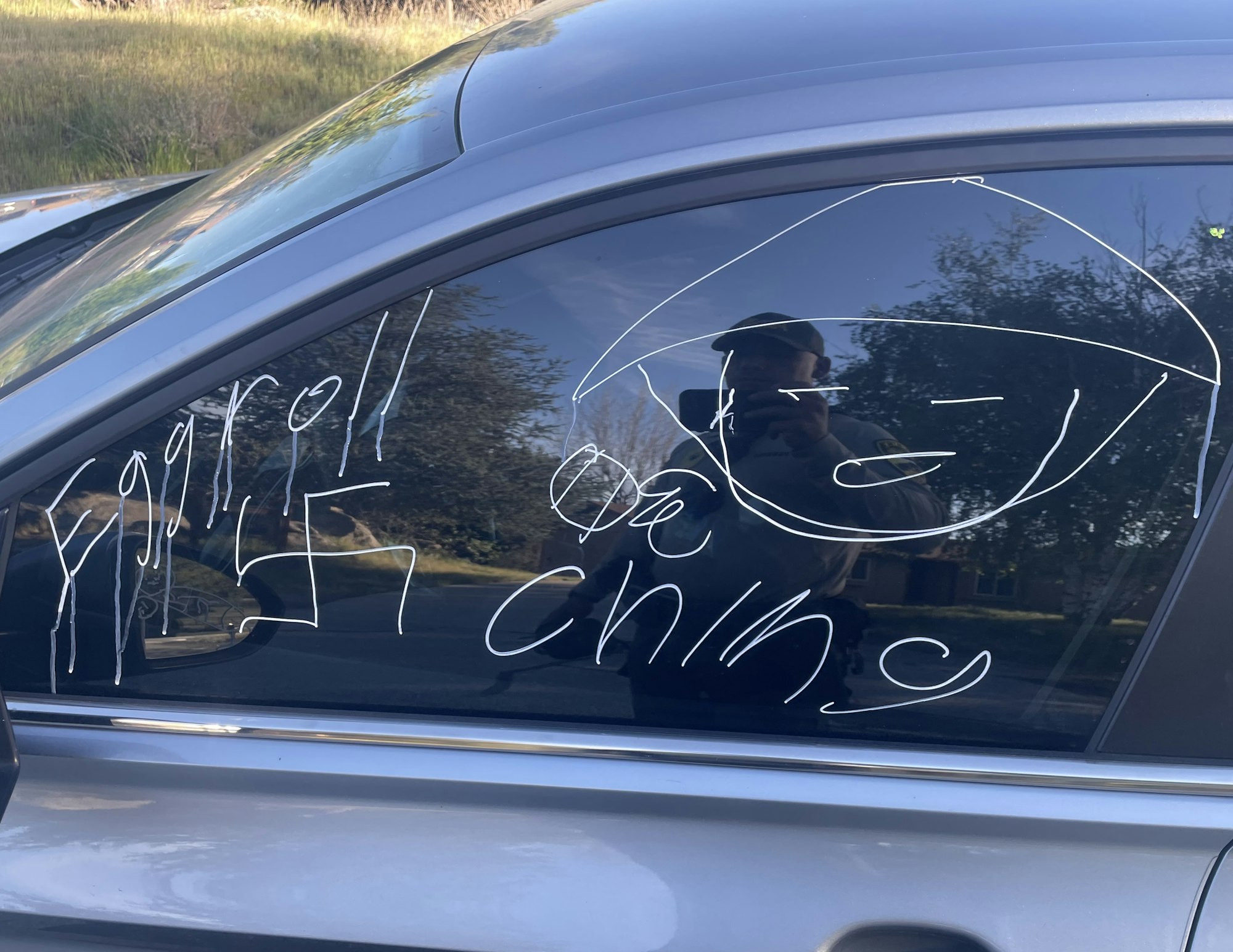 May contain: adult, male, man, person, car, transportation, vehicle, clothing, hat, and glove