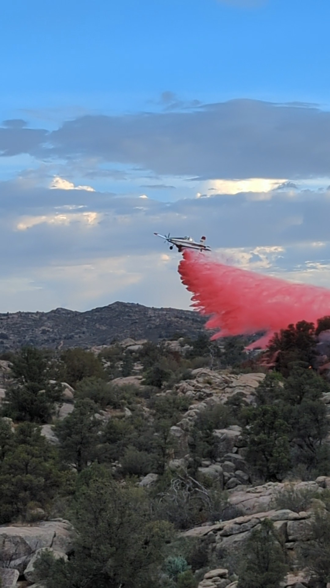 May contain: nature, outdoors, wilderness, plant, tree, vegetation, rock, sky, scenery, mountain, aircraft, airplane, transportation, vehicle, land, woodland, landscape, cloud, and conifer