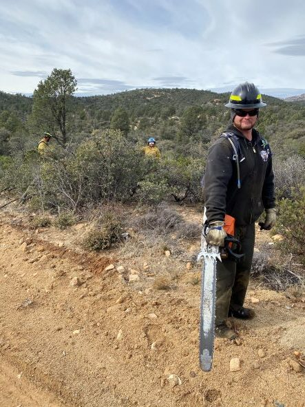 May contain: person, clothing, glove, path, helmet, adult, male, man, footwear, and shoe