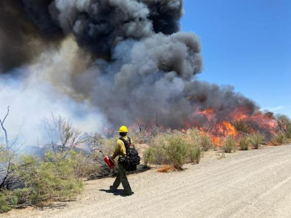 May contain: fire and person