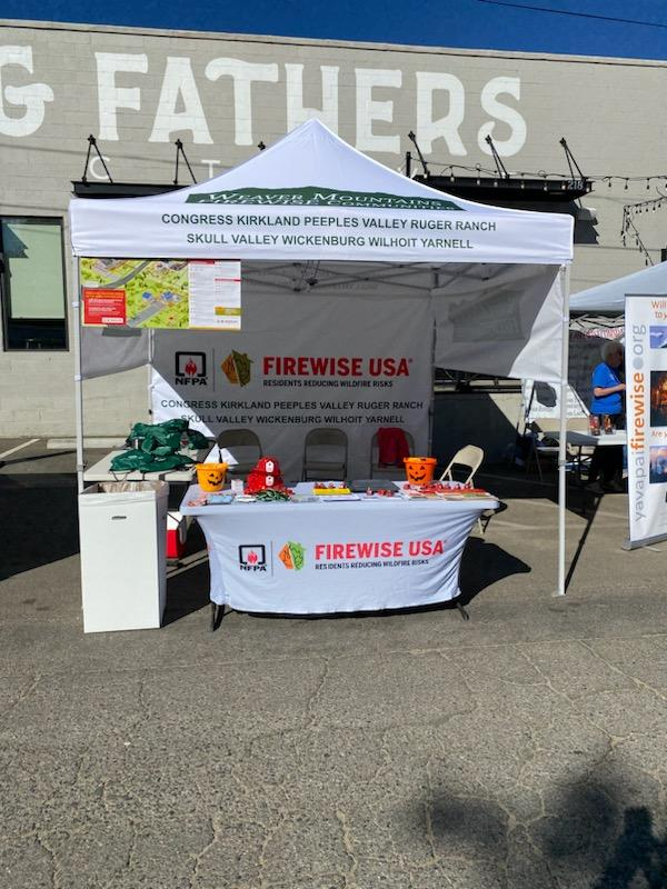 May contain: desk, furniture, table, chair, and person