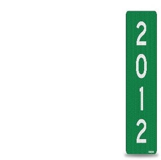 The image depicts a tall green sign with the numbers "2012" prominently displayed on it.