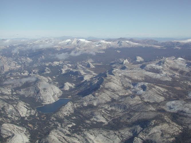 May contain: nature, landscape, outdoors, scenery, mountain, aerial view, mountain range, peak, and panoramic
