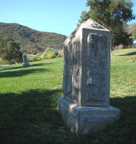 May contain: tomb and gravestone