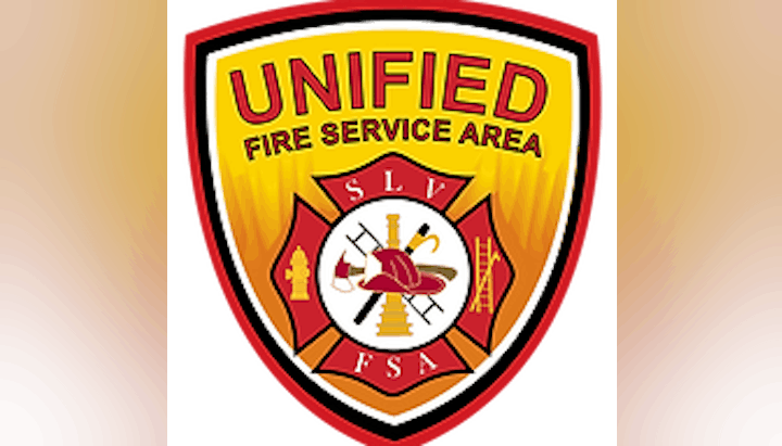 Unified Fire Service Area emblem with fire helmet, axe, hydrant, ladder, and "SLV FSA" text.