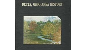 A book cover titled "Delta, Ohio Area History" with an illustration of a landscape with trees and a small river.