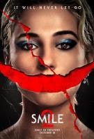 A person with makeup and a wide red smile across them, text says "It will never let go" and "Smile."