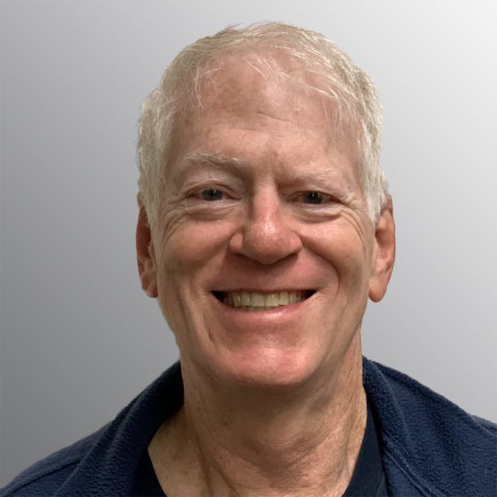 May contain: face, happy, head, person, smile, photography, portrait, adult, male, man, body part, and neck