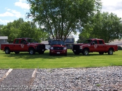 May contain: pickup truck, vehicle, truck, transportation, grass, plant, and car