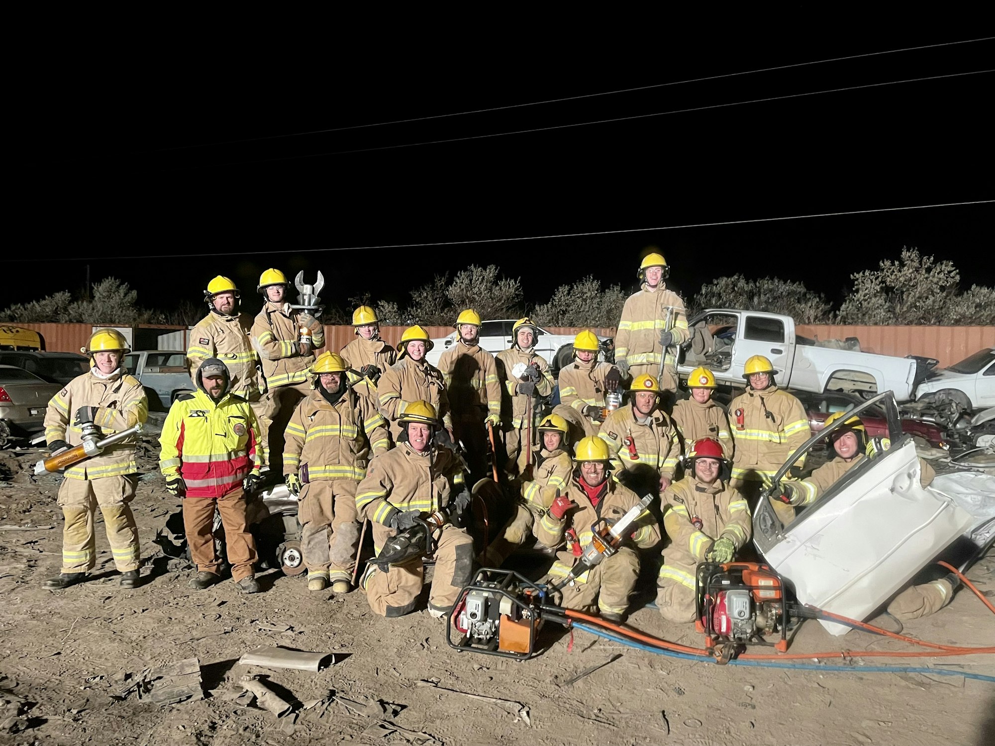 West Valley Firefighters team picture with vehicle extrication tools