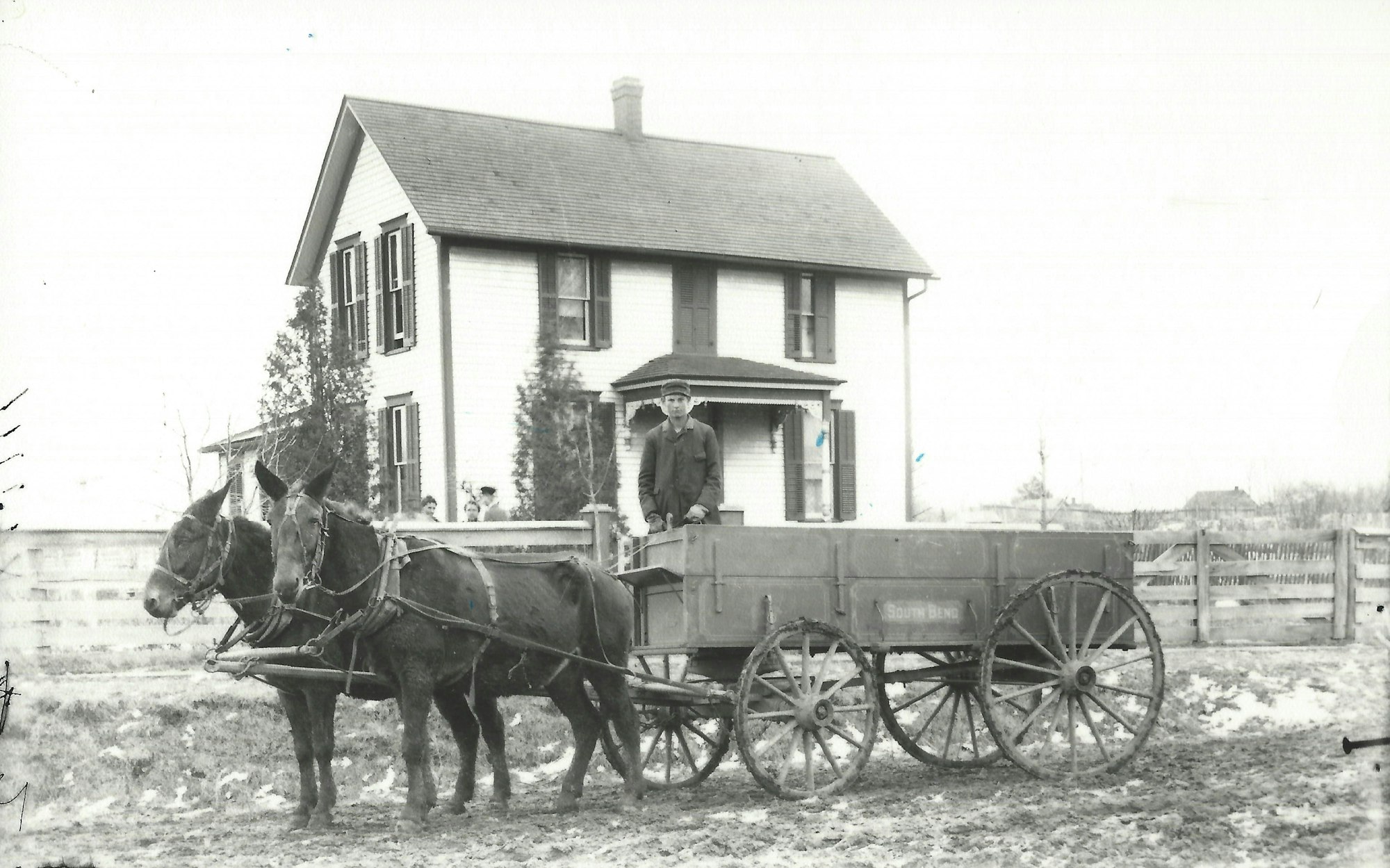 May contain: transportation, vehicle, wagon, person, machine, wheel, clothing, hat, glove, horse cart, spoke, animal, horse, and mammal