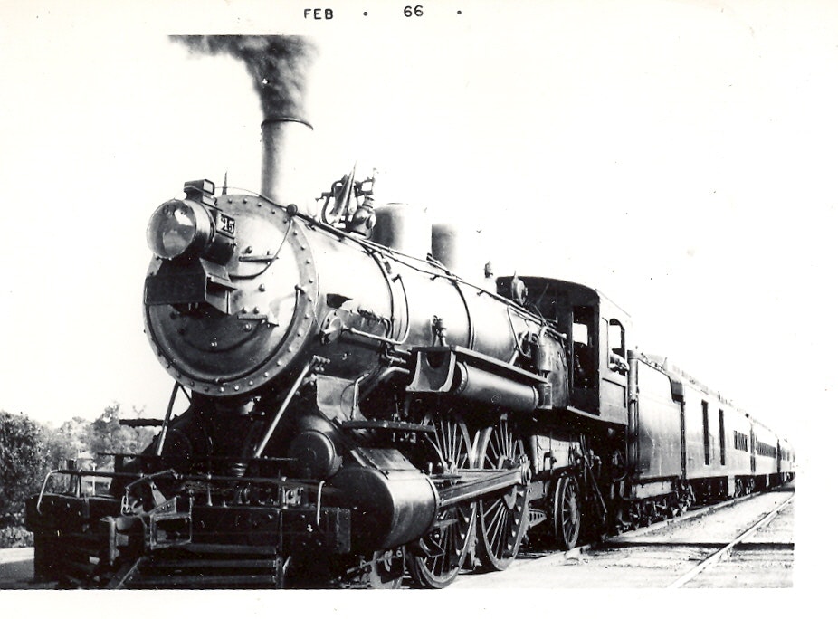 May contain: locomotive, railway, train, transportation, vehicle, engine, machine, motor, steam engine, and wheel