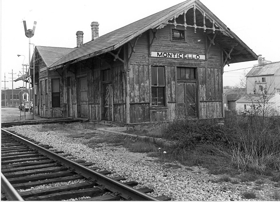 May contain: architecture, building, countryside, hut, nature, outdoors, rural, railway, terminal, train, train station, transportation, vehicle, and car