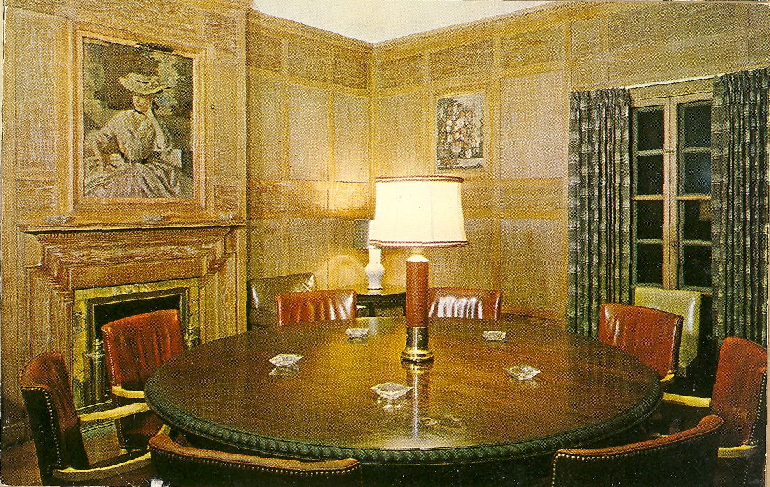 May contain: architecture, building, dining room, dining table, furniture, indoors, room, table, chair, lamp, person, and interior design