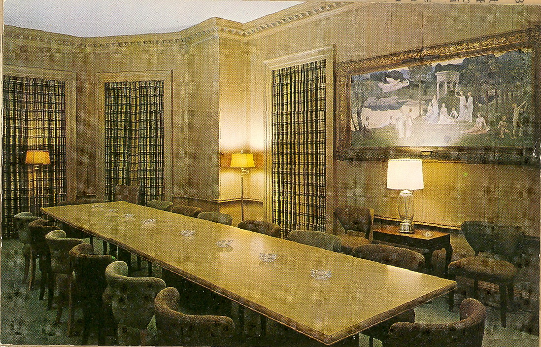 May contain: architecture, building, dining room, dining table, furniture, indoors, room, table, reception, reception room, waiting room, chair, lamp, meeting room, office, person, and interior design