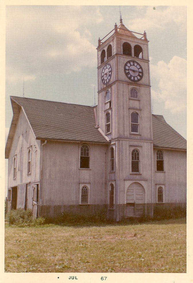 May contain: architecture, building, clock tower, and tower