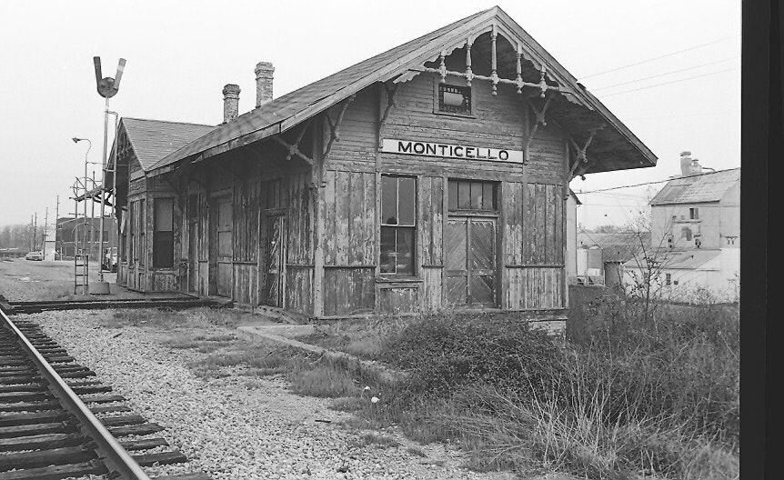 May contain: architecture, building, countryside, hut, nature, outdoors, rural, railway, terminal, train, train station, transportation, vehicle, and car