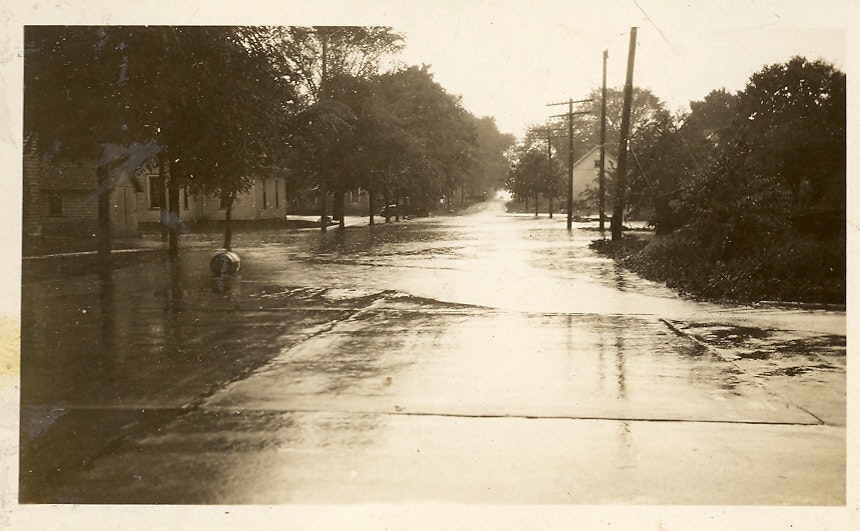 May contain: path, water, city, road, street, urban, flood, and sidewalk