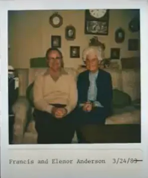 Polaroid photo of a man and a woman