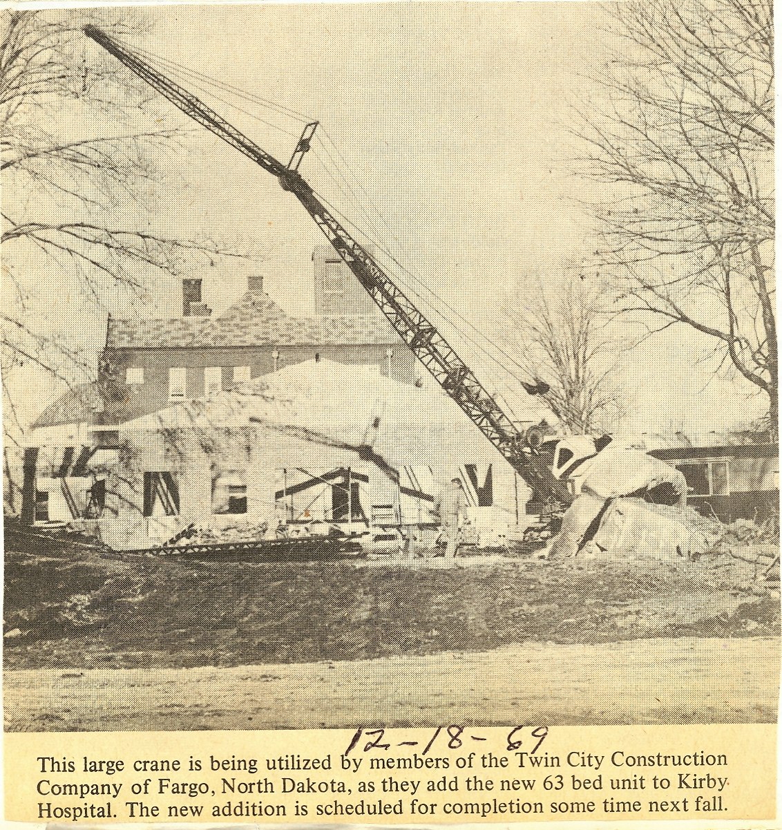 May contain: construction, construction crane, and person
