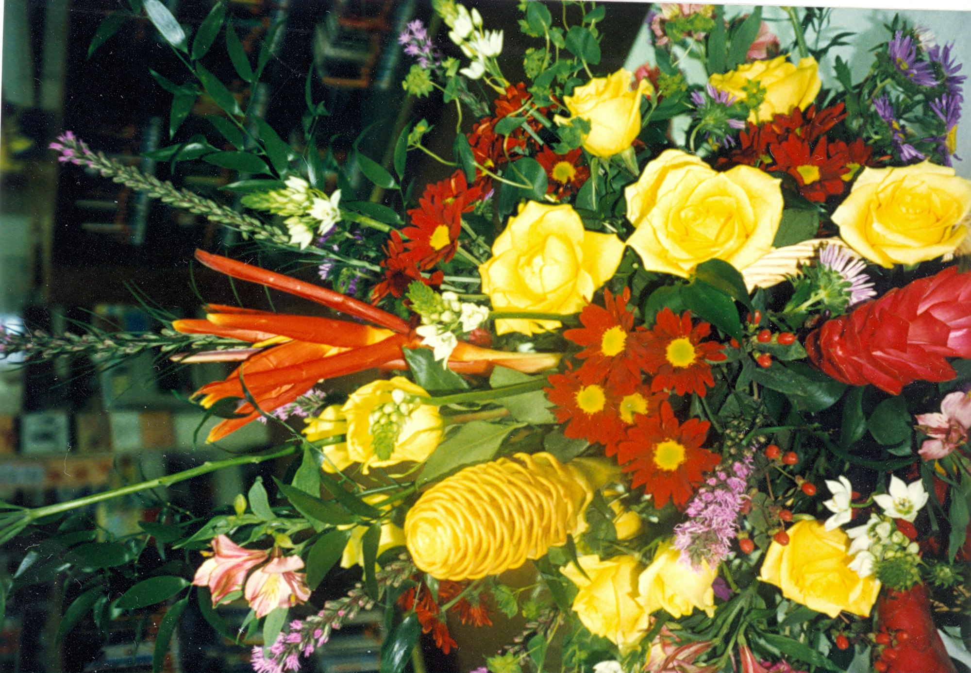 May contain: flower, flower arrangement, flower bouquet, plant, and rose