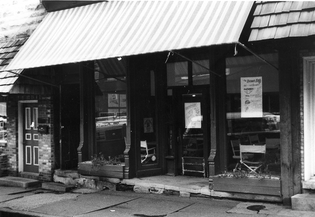 May contain: path, awning, canopy, architecture, building, cafe, indoors, restaurant, city, and brick