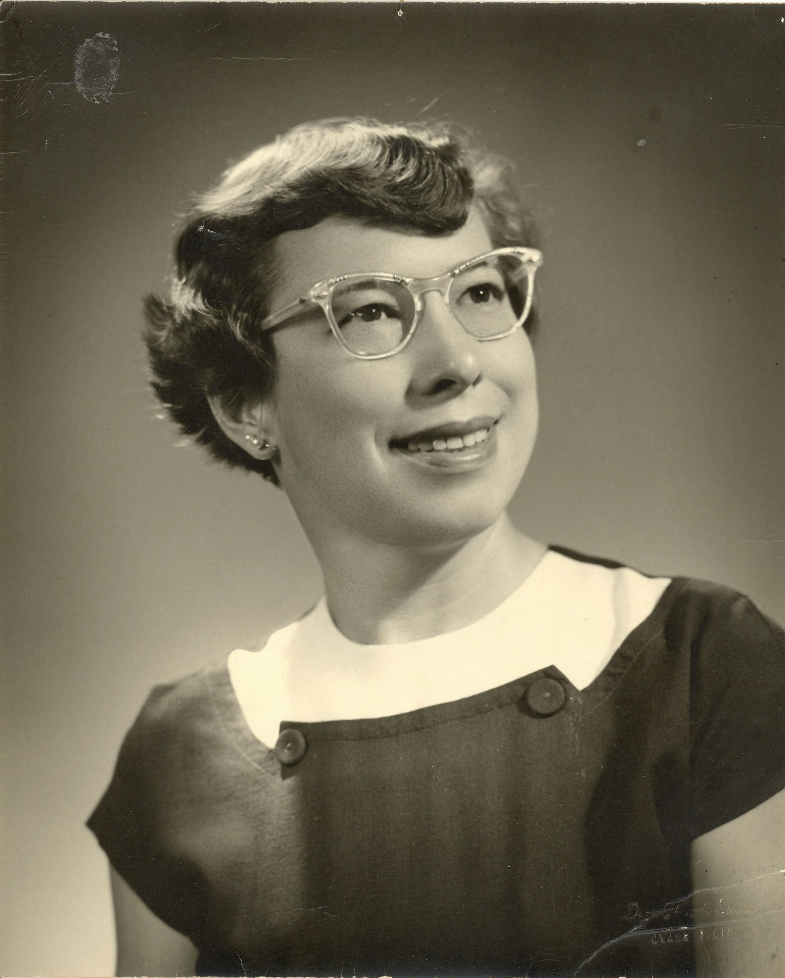 May contain: accessories, glasses, face, head, person, photography, portrait, happy, smile, body part, and neck