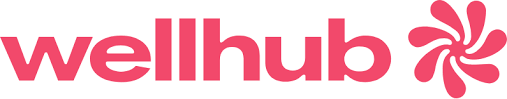 The image shows the "wellhub" logo in pink with a stylized floral icon on the right.