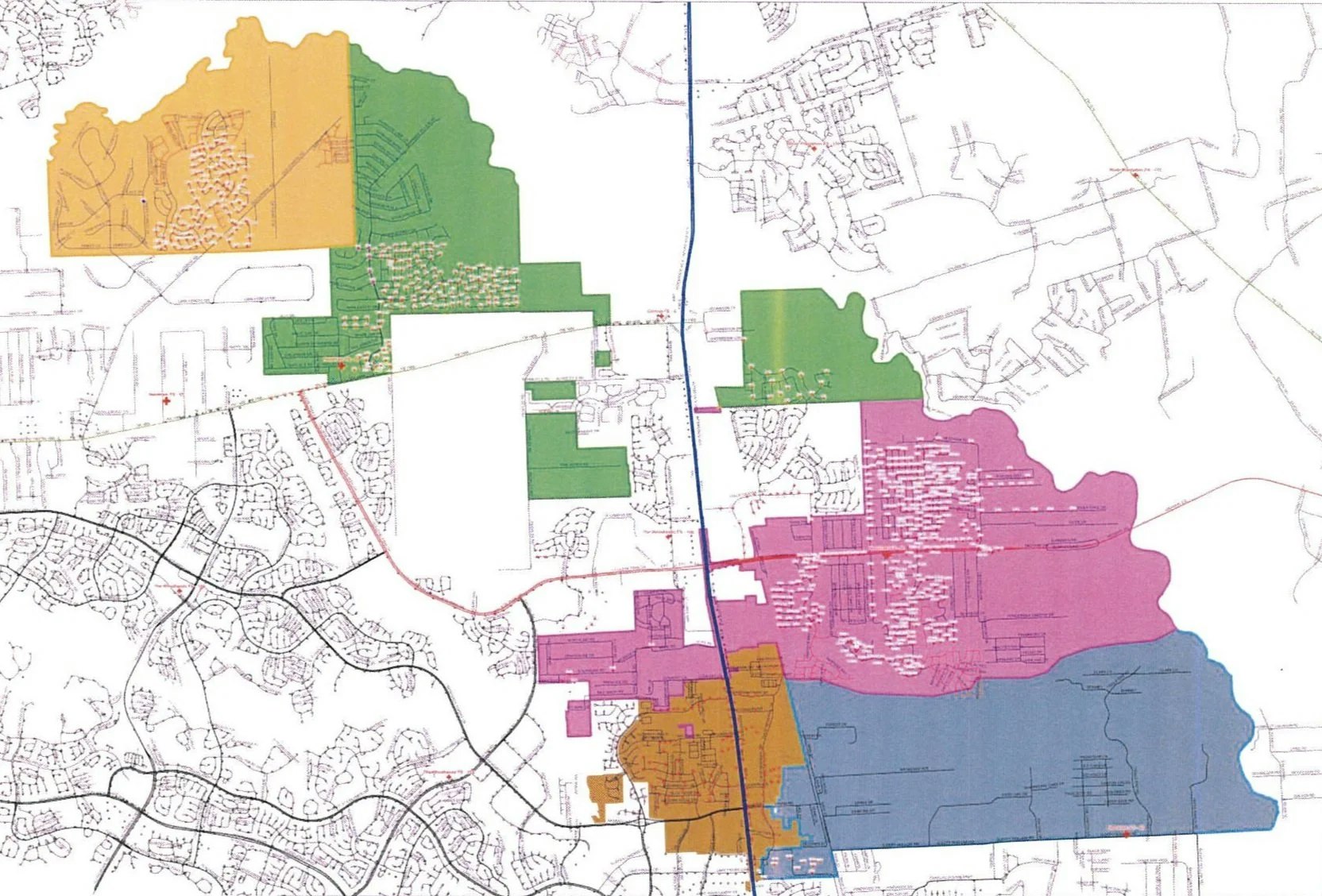 A map with colored areas (yellow, green, pink, blue) representing different zones or regions separated by roads and geographical lines.