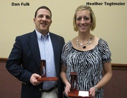 Two people holding awards, smiling, with labels "Dan Fulk" and "Heather Tegtmier" above them.