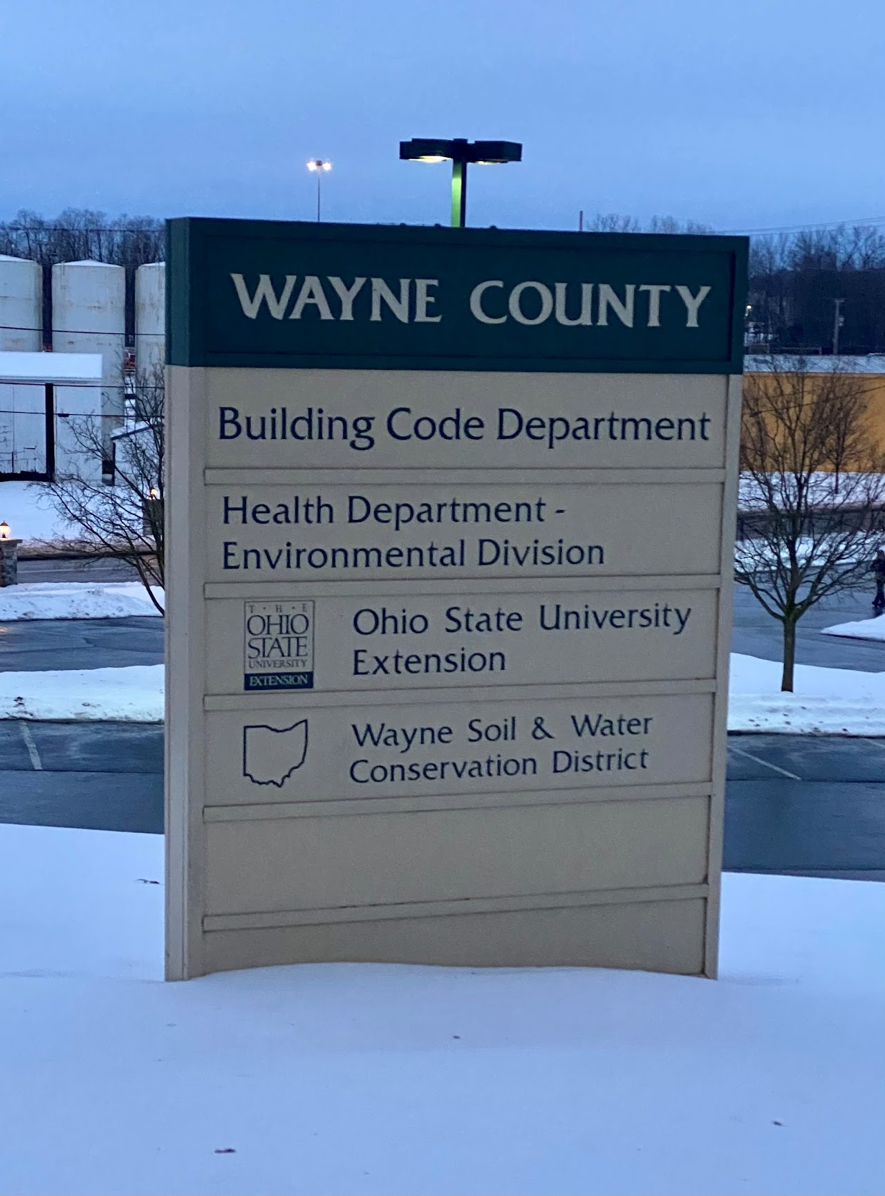 Sign for Wayne County showing various departments: Building Code, Health, Ohio State University Extension, Soil & Water Conservation.