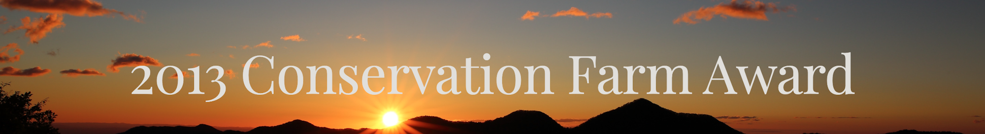 Sunset with "2013 Conservation Farm Award" text overlay.