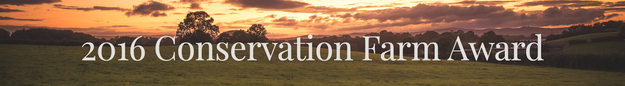 Sunset over fields with text: "2016 Conservation Farm Award."