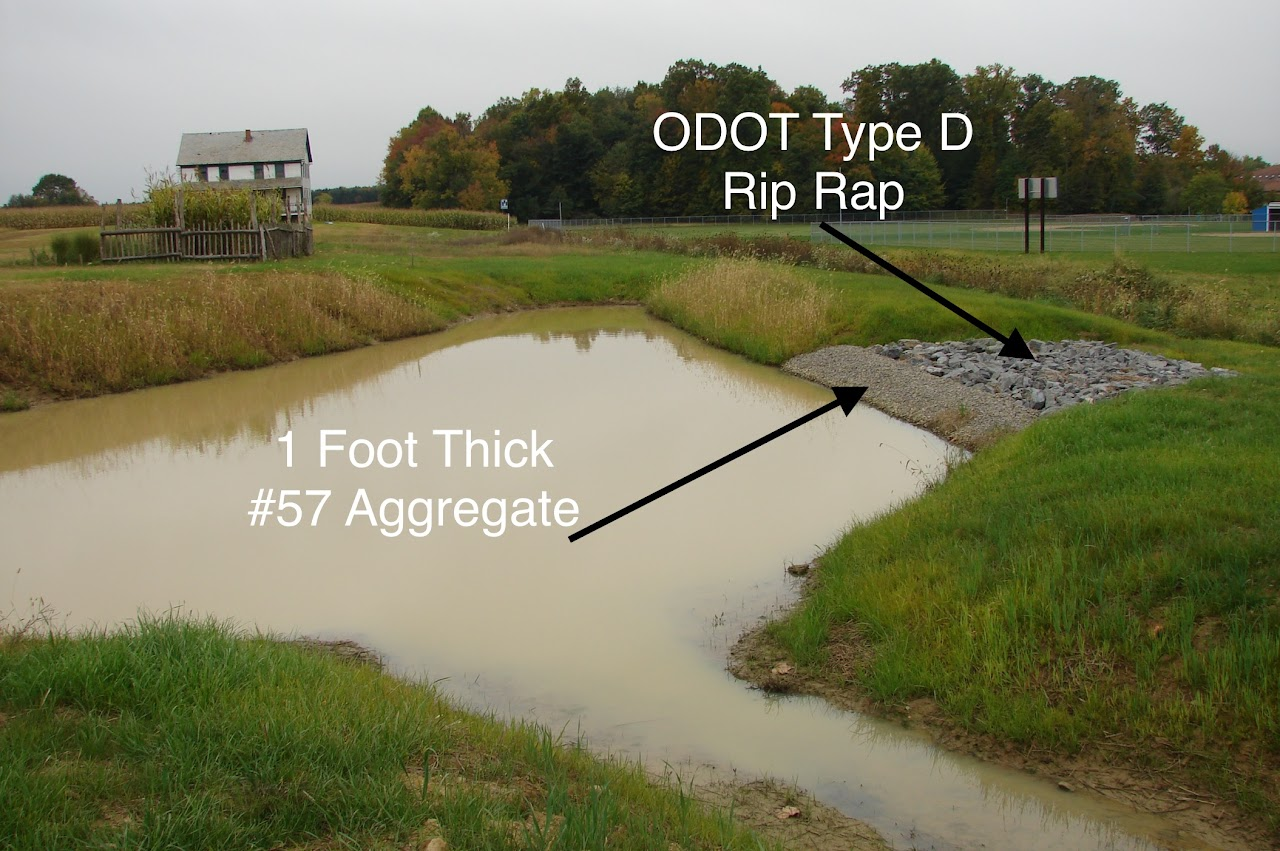 A pond with labeled areas: "1 Foot Thick #57 Aggregate" and "ODOT Type D Rip Rap" near a small house.