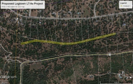 Satellite image showing a marked area for the "Proposed Logtown LT-9a Project." It appears to be a development plan on a wooded terrain.