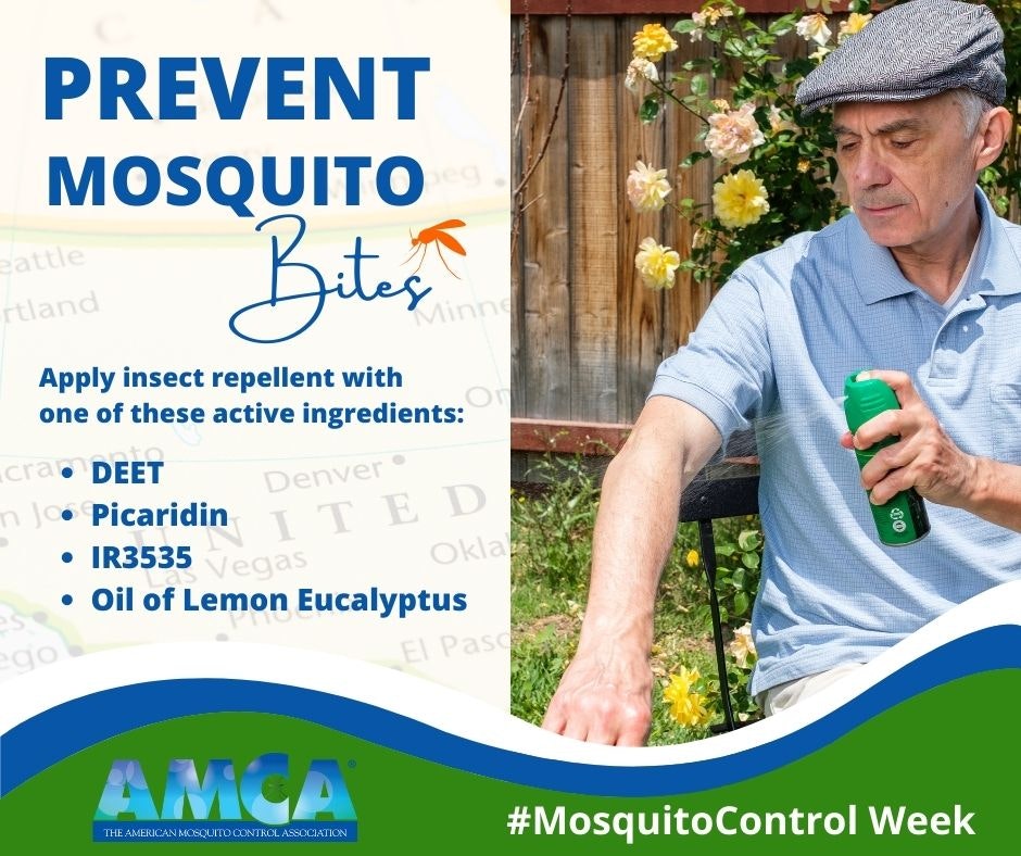 A man applying mosquito repellent spray to his arm.