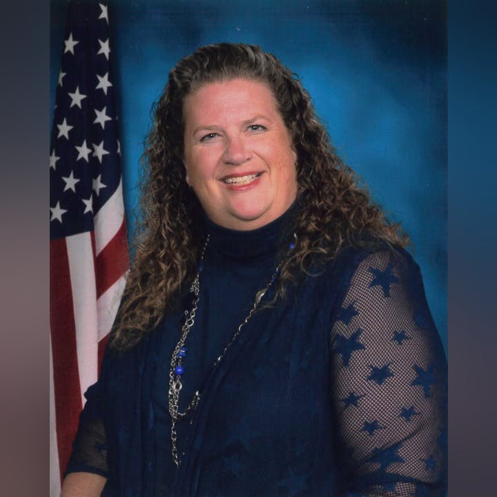 May contain: flag, symbol, person, and human