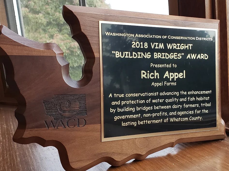 Award plaque: 2018 WACD "Building Bridges" Award to Rich Appel for conservation efforts in Whatcom County.