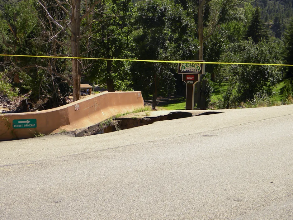 Photo of a sinkhole in a road: 20130918-2013-09-18 11.55.12